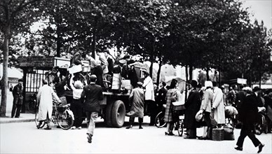 Photograph of refugees in Paris, during the liberation of France from German occupation in the summer of 1944