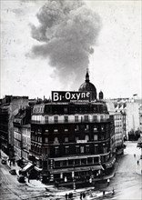 Photograph of black clouds clogging the clear Parisian sky, during the German occupation of France 1940
