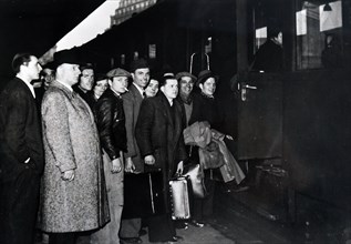 Photograph of young French men travelling by train to enlist in the military during the invasion of France in World War Two