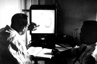 Photograph of an early ultrasound in use