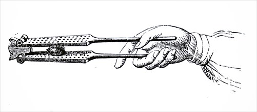 A nutcracker in which the fulcrum of the lever is at left
