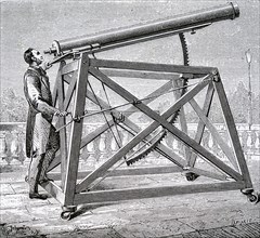 A small refractor mounted on a wheeled frame
