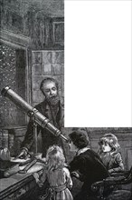 Children looking at the night sky with a portable refractor