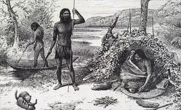 Australian aborigines in their encampment