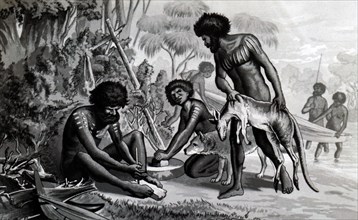 Engraving of Australian aborigines preparing a meal beside a river