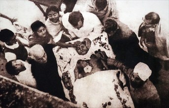 Mohandas Karamchand Gandhi 1869 – 1948) at his cremation following his assassination in 1948