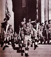 Photograph of the last remaining British troops leaving India through the India Gate