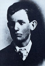 Police profile and photograph of John McCoy an American criminal