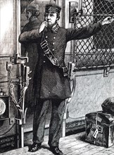 A train guard blowing a whistle to indicate that the train is about to leave