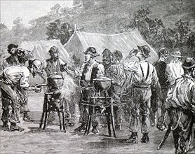 A camp for 'navvies' - the workmen being served oatmeal and water