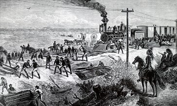 The laying of track on the Pacific Railroad