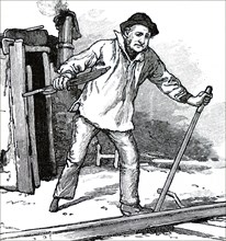 A signalman moving the points at Tilbury Docks