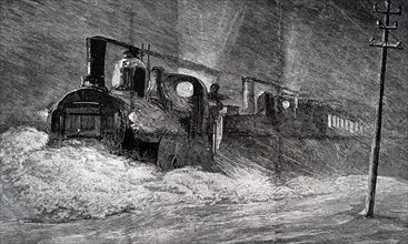 A locomotive snowplough being used to clear a snow drift in Northumberland