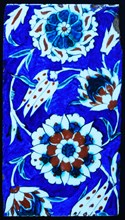 Iznik ceramic tile decorated with vines, grapes and flowers