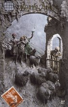 French postcard dated circa 1900, showing a relief scene of shepherds tending a flock