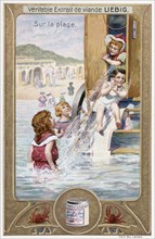 Leibig card depicting French children on the beach 1890