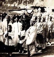 Funeral in Seoul, korea adopting traditional clothes and rituals of the Joeson Era. Circa 1900