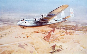 By air to India in 1949. A BOAC Avro York flying over the Pyramids en route for Calcutta from London