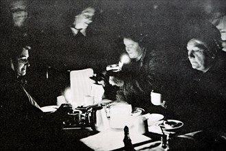 People having a meal by candle light at a Clapham restaurant during the power station workers strike