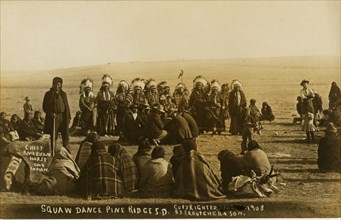 Squaw dance, Pine Ridge. Photograph shows a group of Sioux women