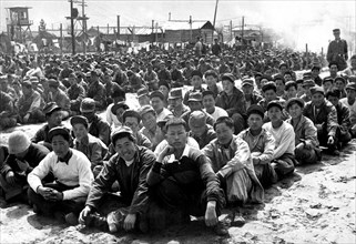 At the United Nations' prisoner-of-war camp at Pusan, prisoners are assembled in one of the camp compounds