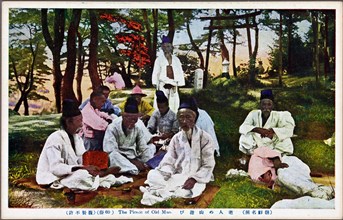 A gathering of elderly men for a picnic. Korea