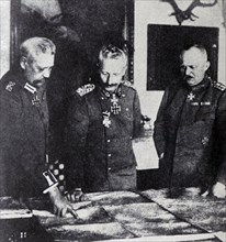 German officers viewing a map of Europe during World War I