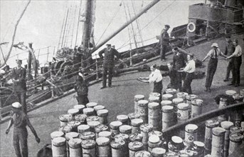 HMS Agamemnon taking ammunition aboard during the early stages of the Gallipoli Campaign