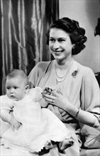 H.R.H. Queen Elizabeth II and Prince Charles as a baby