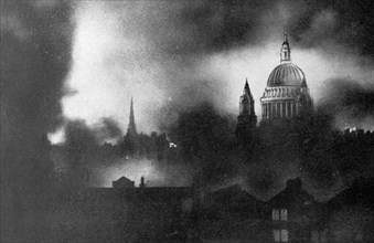 St Paul's Cathedral and London burning after a bombing raid by the Lufthansa during World War II