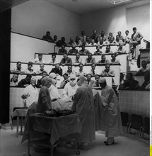 Students watching an operation at a gynaecological hospital, Germany