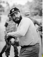 Fidel Castro is playing baseball
