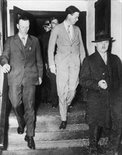 Charles Lindbergh leaves court, 1935