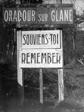 Kriegsverbrecherprozess - Schild am Ortseingang von Oradour in Frankreich