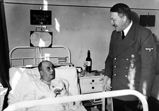 Adolf Hitler visiting one of his general after the 20 July plot outrage