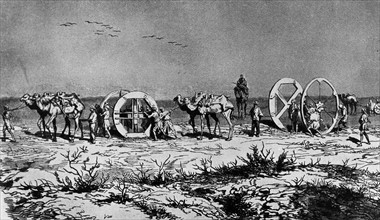Camels carrying building materials for the Suez canal