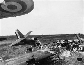 Wrecked fighter planes in a french airfiled
