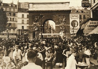 Paris (France). Dancing in the street at the Porte Saint-Martin on the occasion of the French