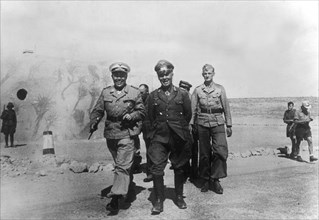 Rommel, Erwin 1891-1944
Officer, general field marshall, germany
commander of the german africa corps Feb.41-March 43 (WWII) 
Rommel (C) togehter with general field marshall Albert Kesselring (C-in...