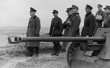 ERWIN ROMMEL (1891-1944). /nGerman Field Marshal. Rommel, commander of the German Afrika Korps, inspecting the German position at the Atlantic Wall near Fecamp, Normandy, France. Photographed 17 Janua...