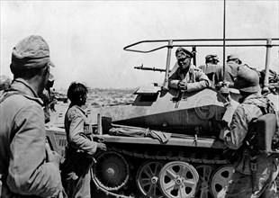Rommel, Erwin 1891-1944
Officer, general field marshall, germany
commander of the german africa corps Feb.41-March 43 (WWII) 
Col.Gen. Rommel in his armoured command post vehicle ahaed of Tobruk (t...