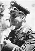 Rommel, Erwin 1891-1944
Officer, general field marshall, germany
commander of the german africa corps Feb.41-March 43 (WWII) 
Portrait as Lt.Gen ahaed of Tobruk, June 1941