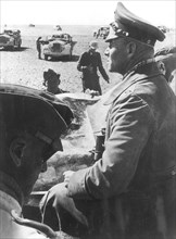 Rommel, Erwin 1891-1944
Officer, general field marshall, germany
commander of the german africa corps Feb.41-March 43 (WWII) 
Col.Gen. Rommel in his command post vehicle during the offenive May/Jun...