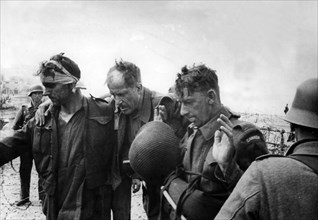 WW II, France: Failed Dieppe Raid : Royal Canadians taken prisoner after surrender,