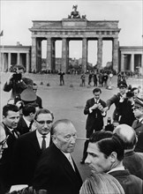 Konrad Adenauer (center left) at the Brandenburg Gate