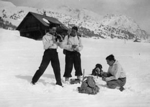 Paul Emile Victor, Robert Gessain and M. Michel Perez shortly before the start of their expedition to Greenland. Montgenèvre. France. Photograph. March 2nd 1936.