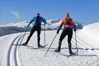 Olympic silver medalist Tobi Angerer with his wife Romy on the cross-country ski trail of Winklmoos-Alm