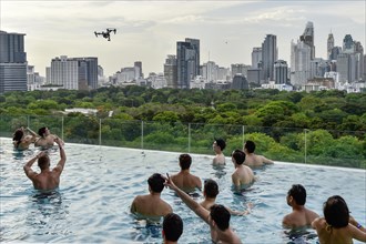 DJI Inspire 1 drone flies over Swimminpgool