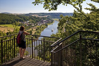 Woman looks from the Skywalk on the Weser