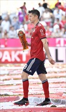 Robert Lewandowski FC Bayern Munich with Paulaner wheat beer for beer shower